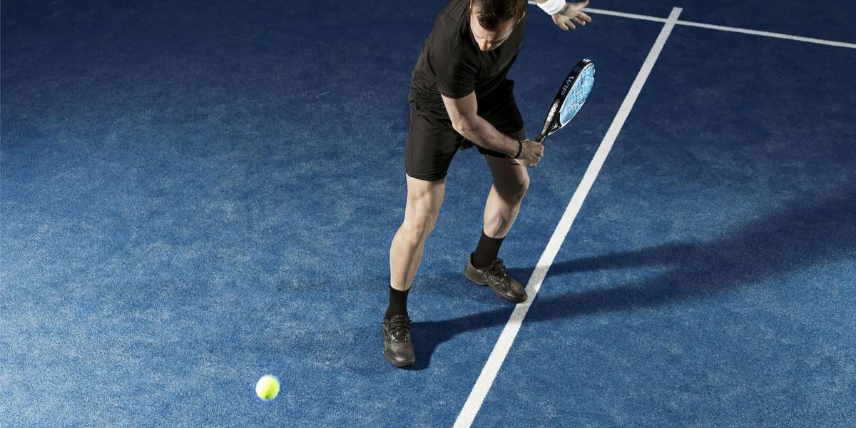 Player with a padel racket on court